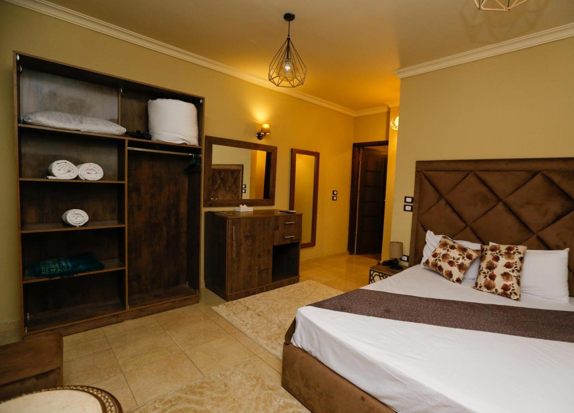 Al Kawm al Akhdar Master Pyramids Hotel מראה חיצוני תמונה