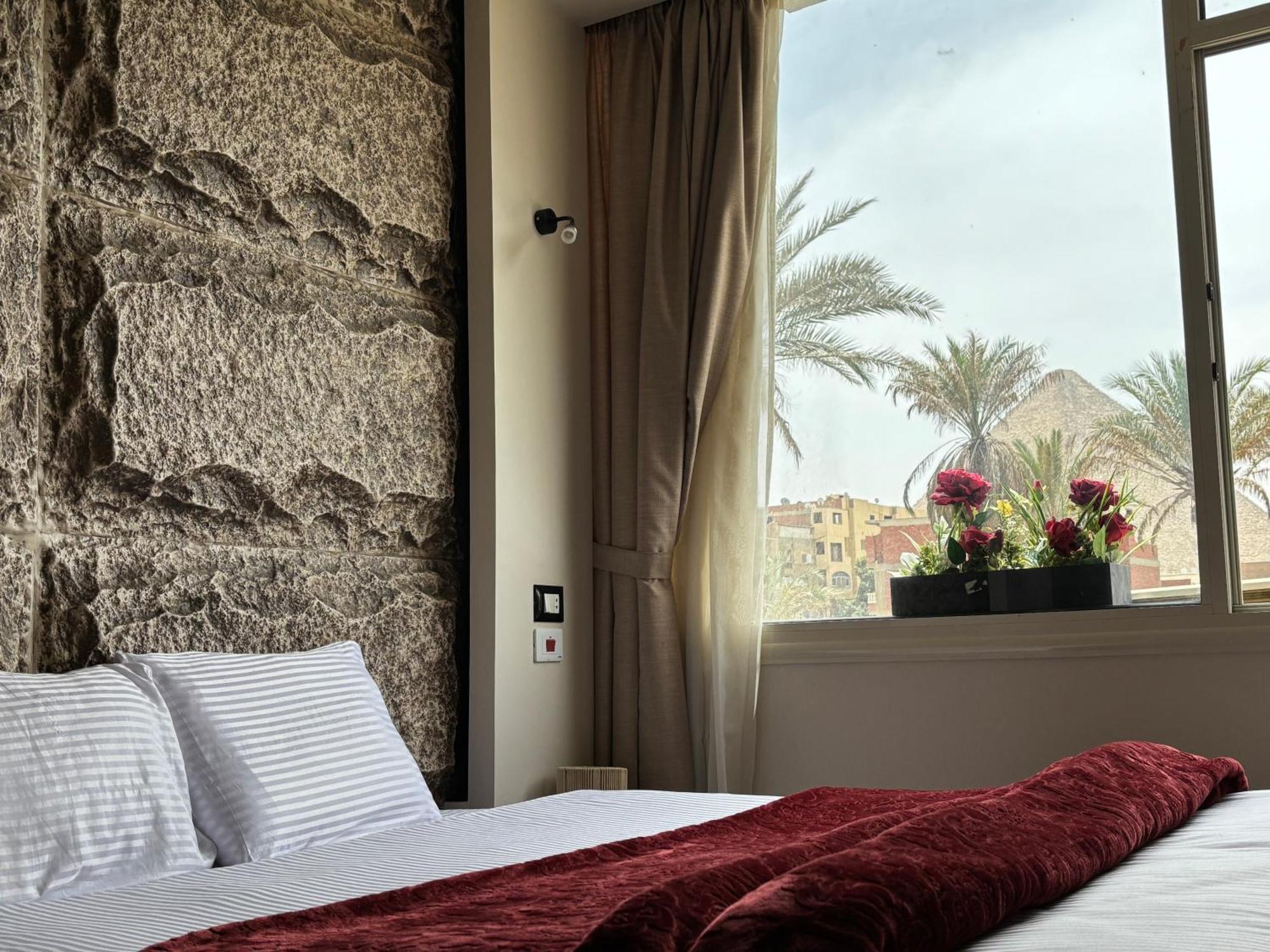 Al Kawm al Akhdar Master Pyramids Hotel מראה חיצוני תמונה